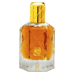 Picture of a Bottle of Perfume Ahmed Al Maghribi Bin Shaikh Crystal glass bottle filled with yellow color liquidPerfume) good lookin stylish bottle.